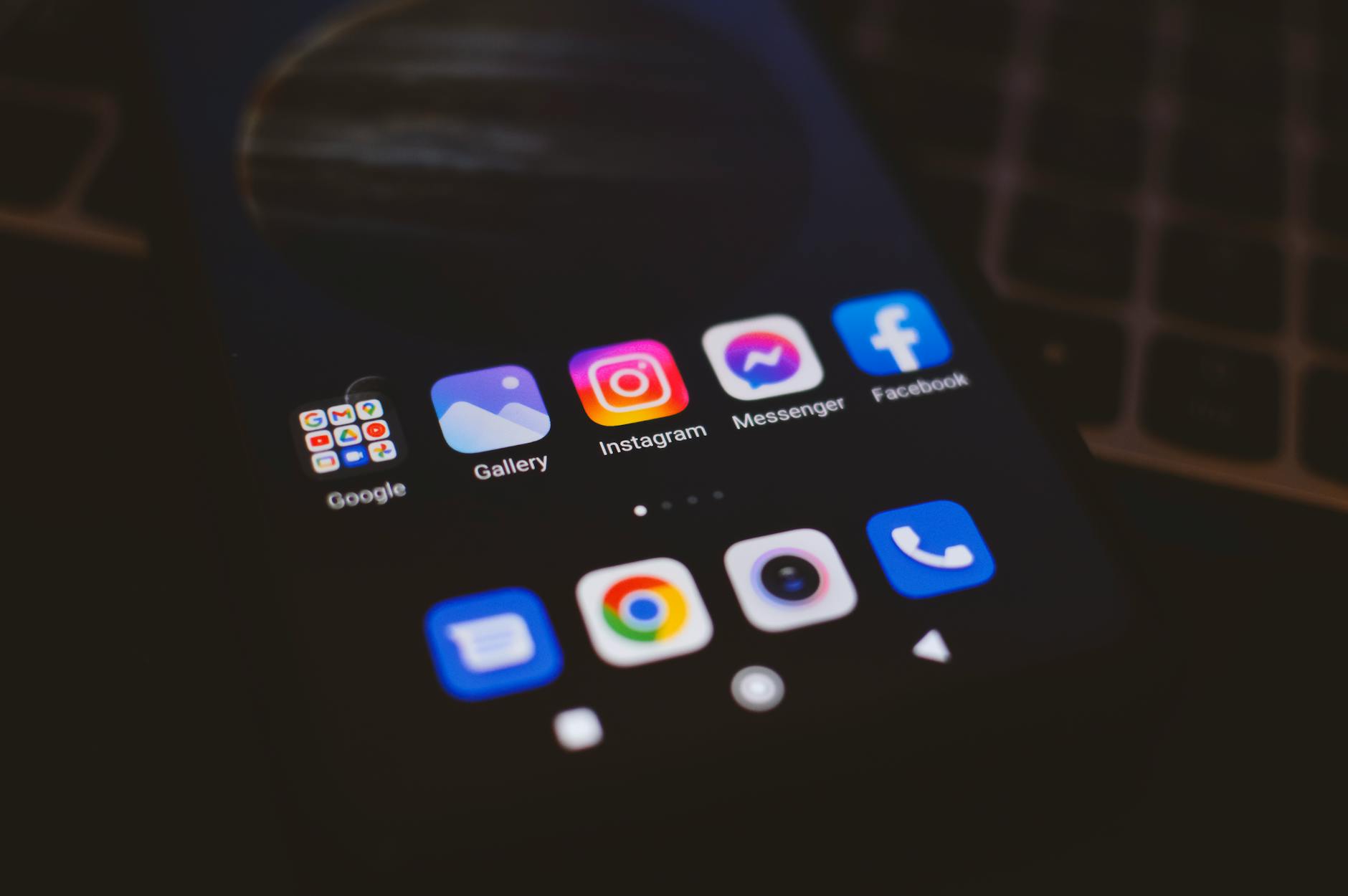 a close up shot of a mobile phone with applications on screen